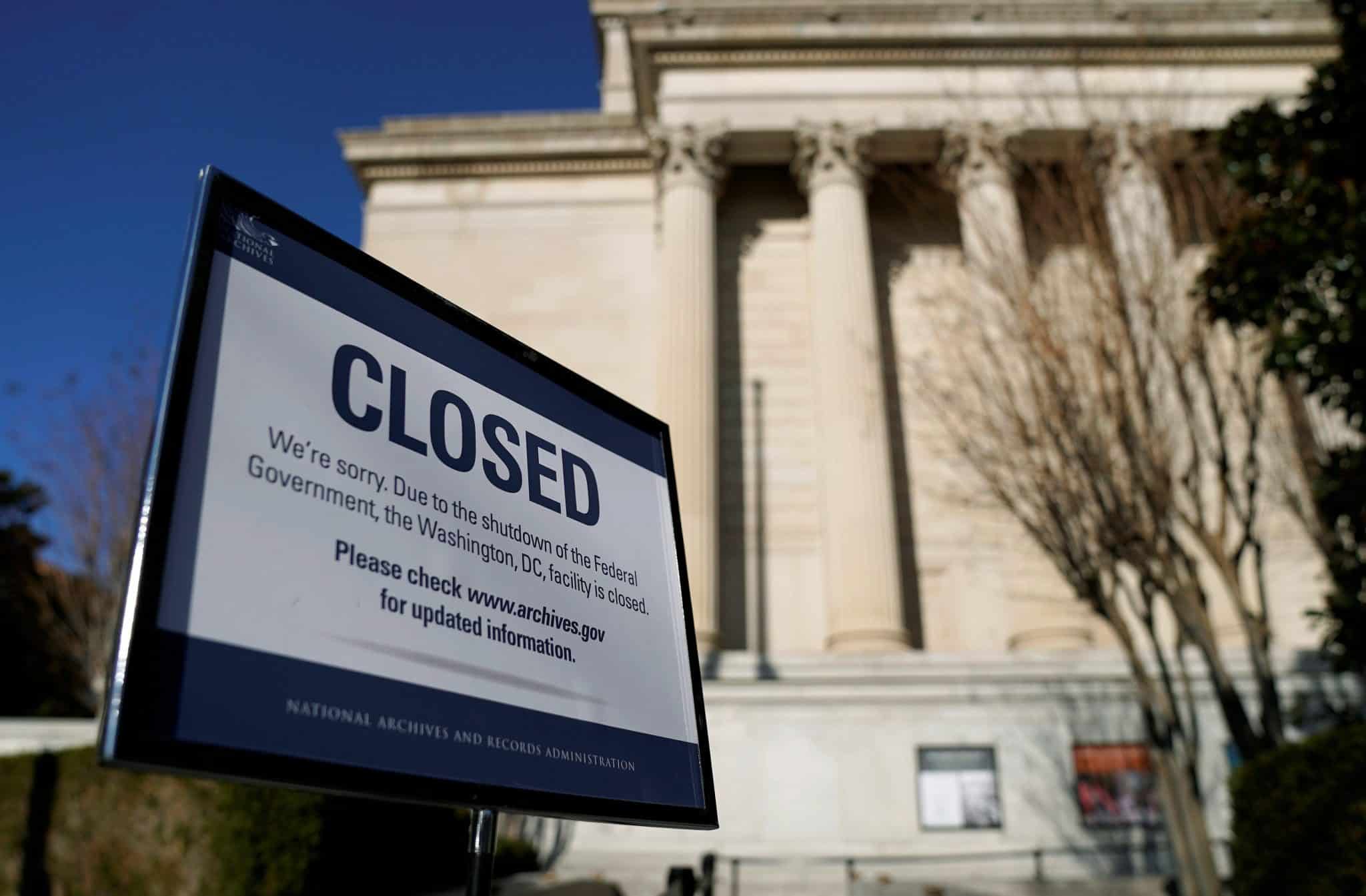 A sign declares the National Archive is closed due to a partial federal government shutdown in Washington