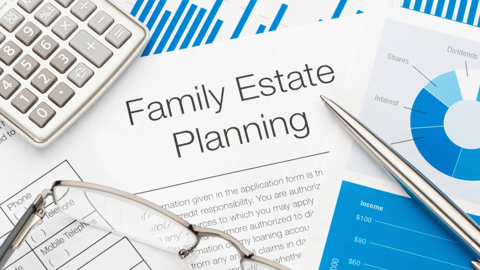 Family estate planning document with financial charts and calculator.