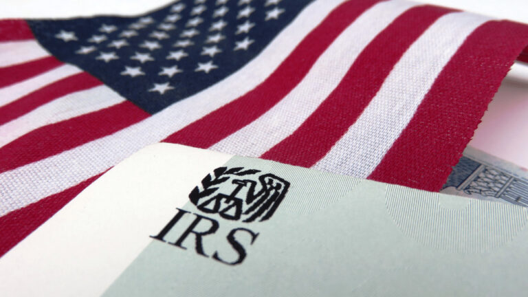 IRS logo with American flag in background, symbolizing tax relief.